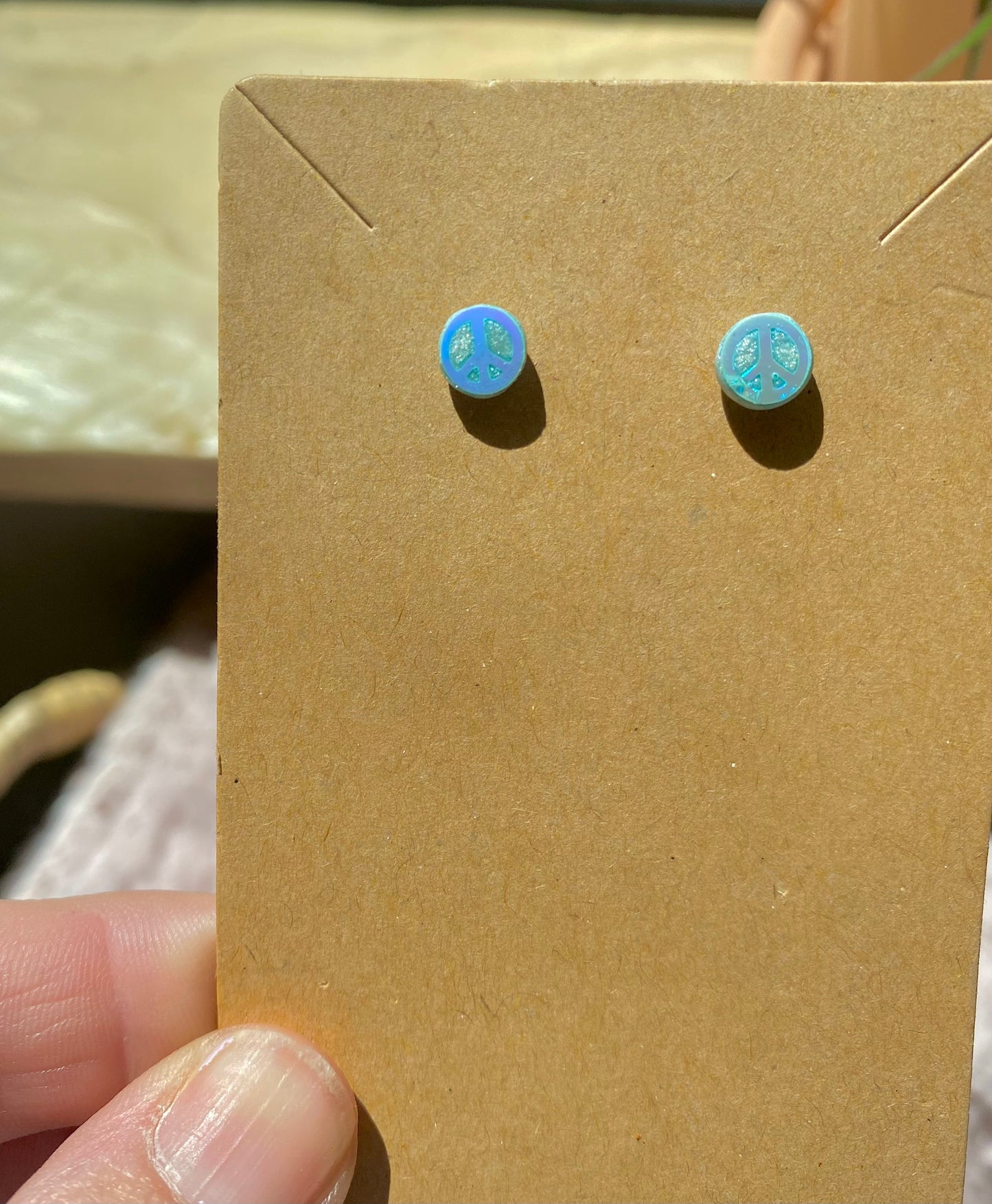 Tiny Peace Sign Studs — blue