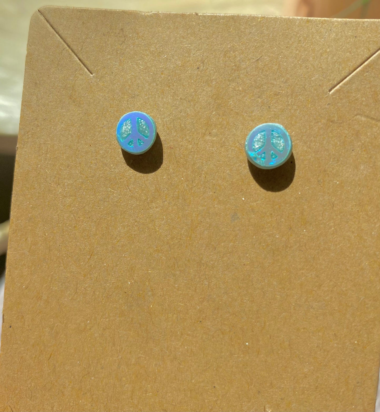 Tiny Peace Sign Studs — blue