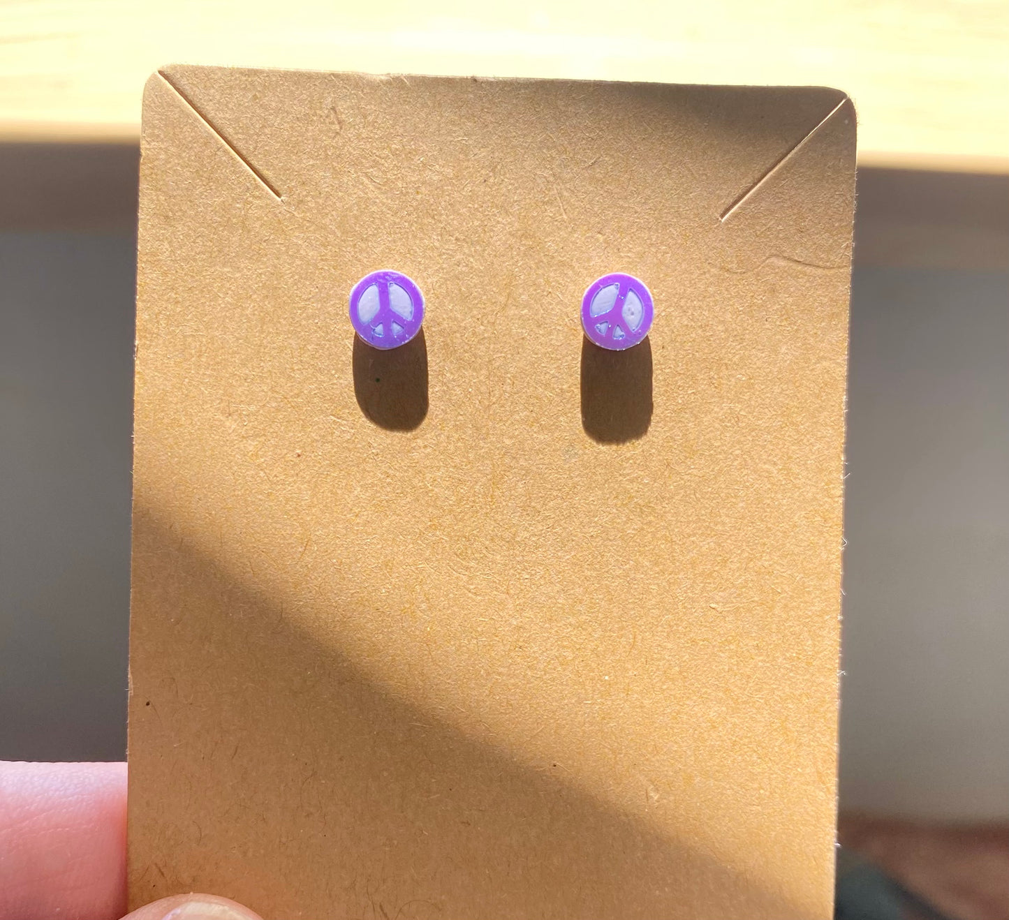 Tiny Peace Sign Studs — purple