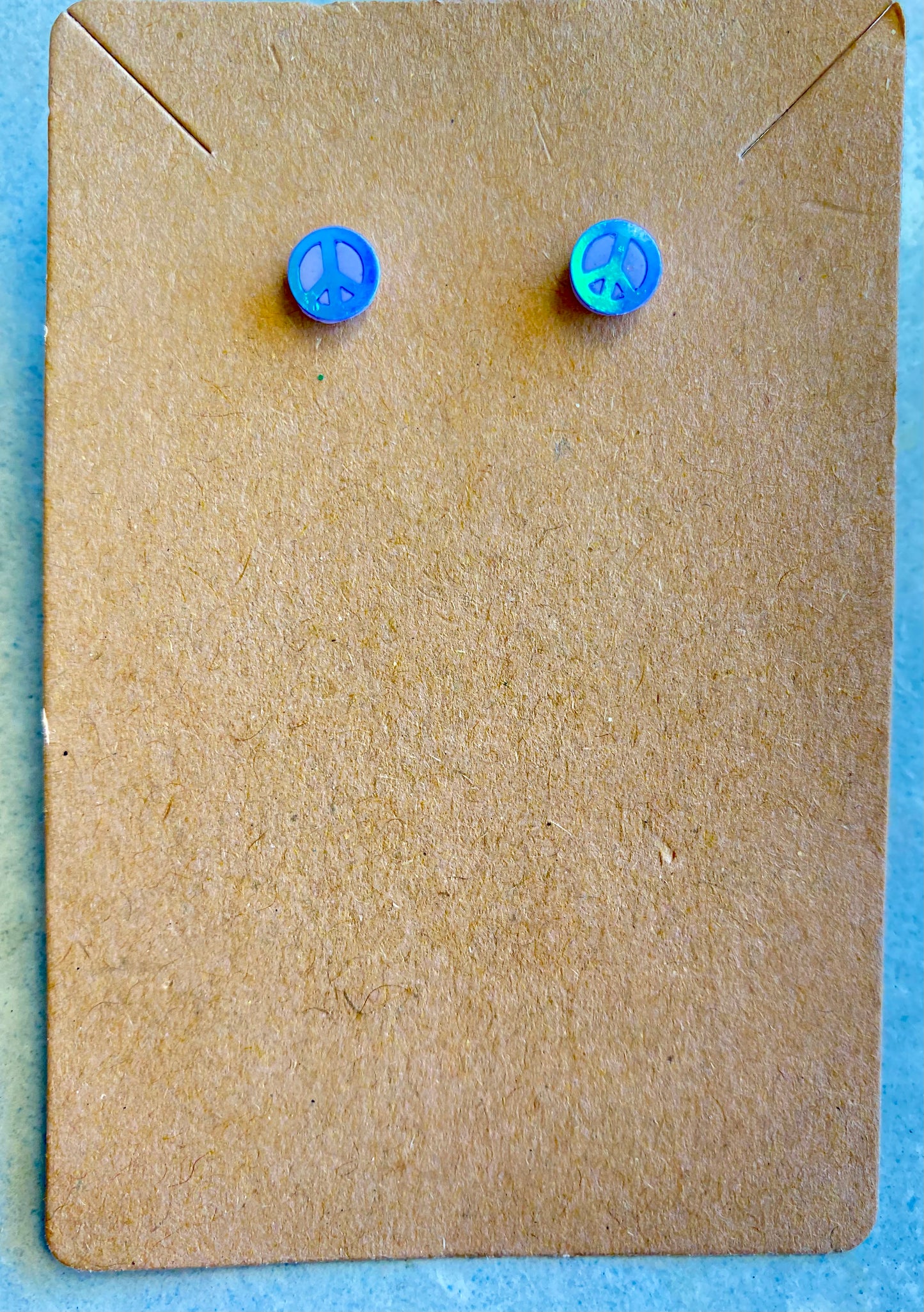 Tiny Peace Sign Studs — blue