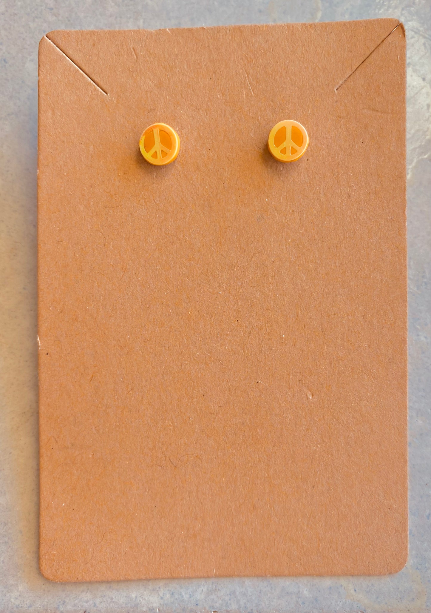 Tiny Peace Sign Studs — yellow